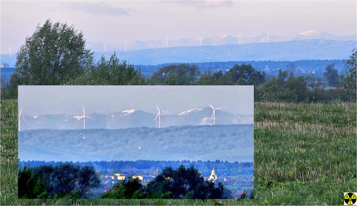 Вид із закинутого німецького цвинтаря на Карпати на найбільшу діючу ВЕС